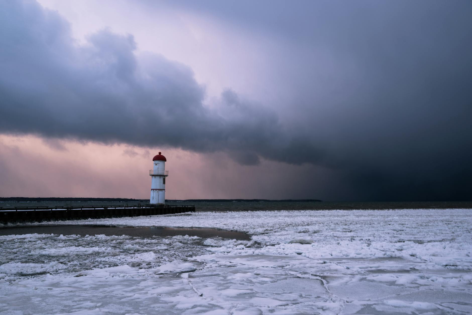 dramatic winter lighthouse scene in montreal
